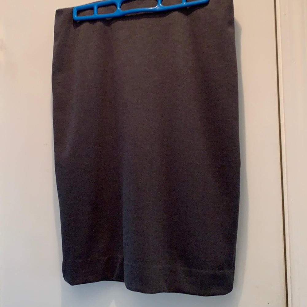 Dark grey skirt.